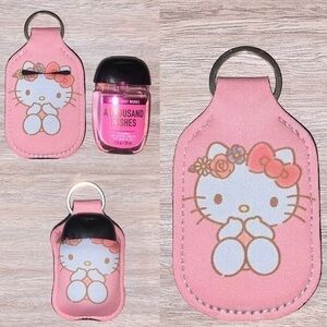 $8 firm. Hello Kitty pink hand sanitizer holder new